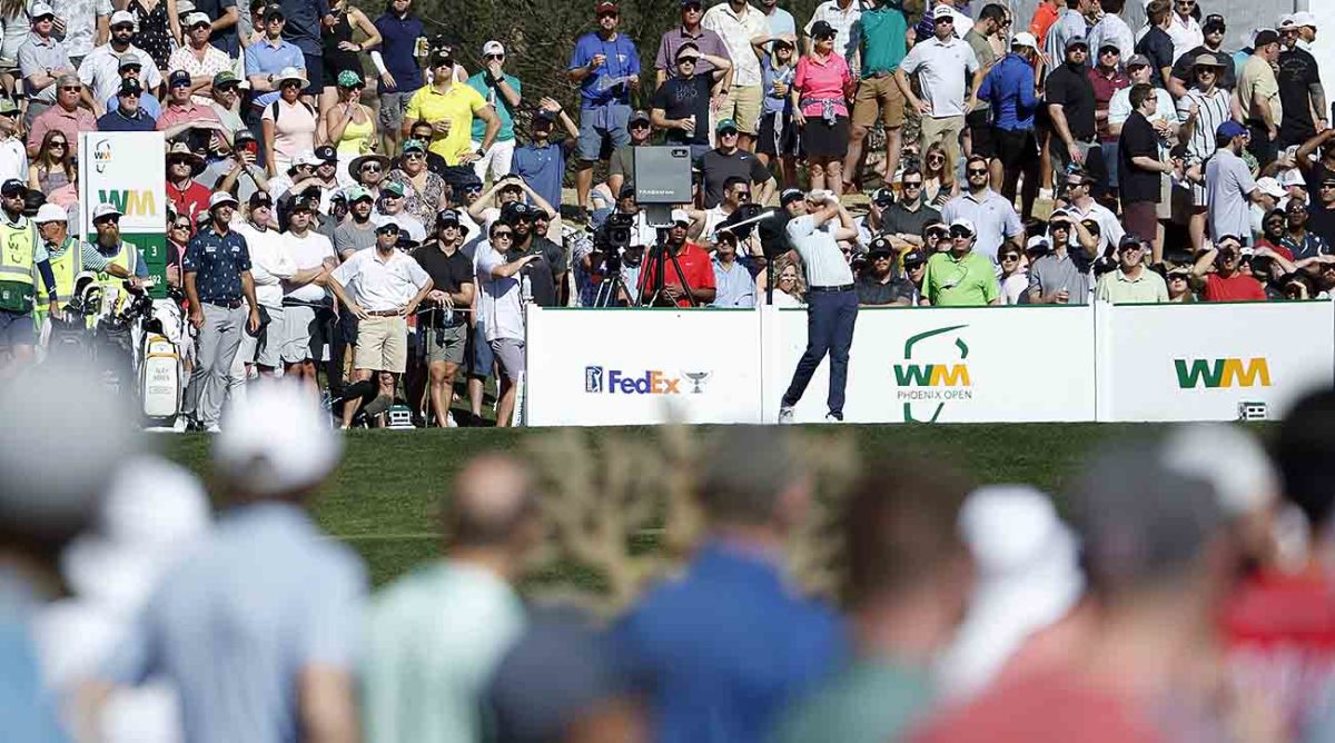 J.T. Poston hits his tee shot on the 12th hole during the third round of the 2022 WM Phoenix Open at TPC Scottsdale in Scottsdale, Ariz.